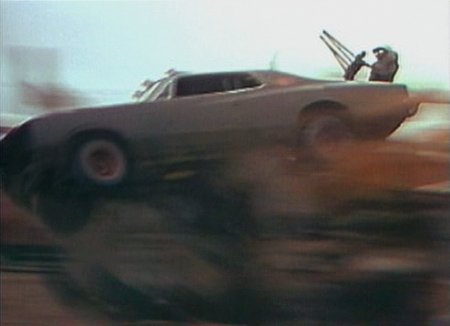 Max Aspin crashes the valiant into the moat, Mad Max 2