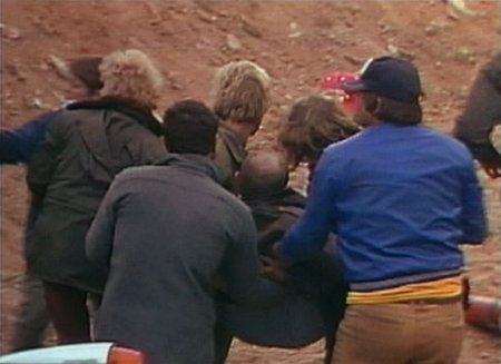 Max Aspin is carried away for medical attention